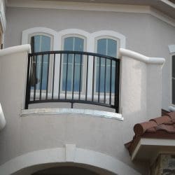Arched iron balcony rail